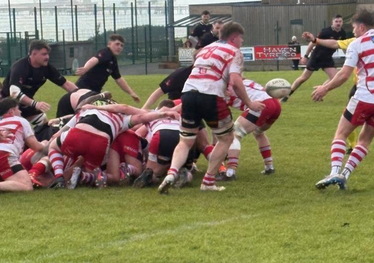 Zak Davies (8) involved in all Milford did. Picture Bill Carne
