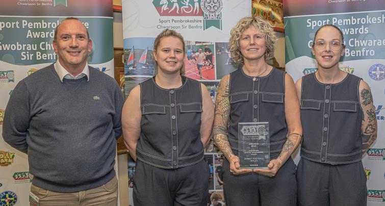 Welsh Walking Football team members receive a special award