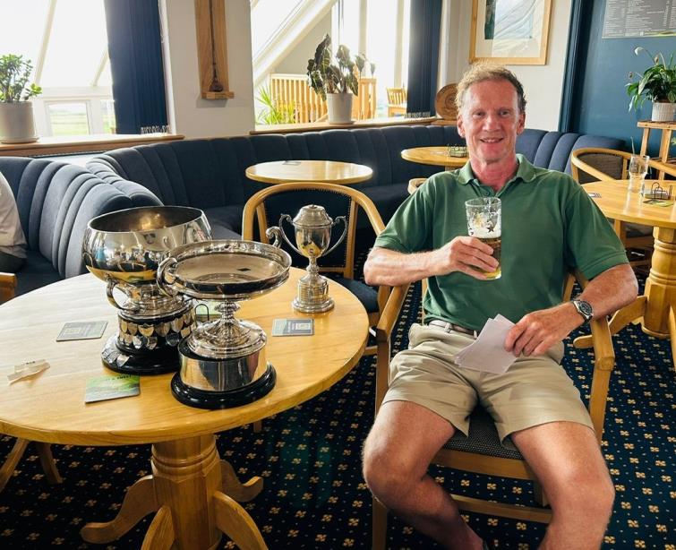 Alan understandably relaxed after winning all three trophies at the Dyfed Mens competition