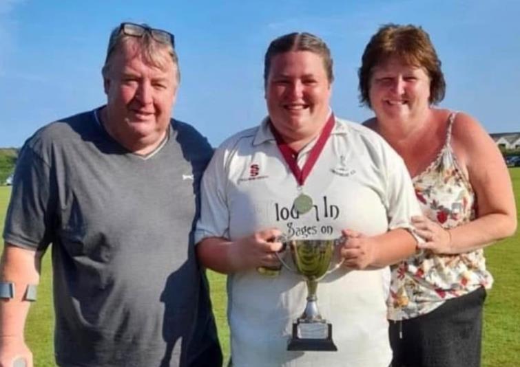 Mark, Ffion and Julie Ashman celebrate silverware