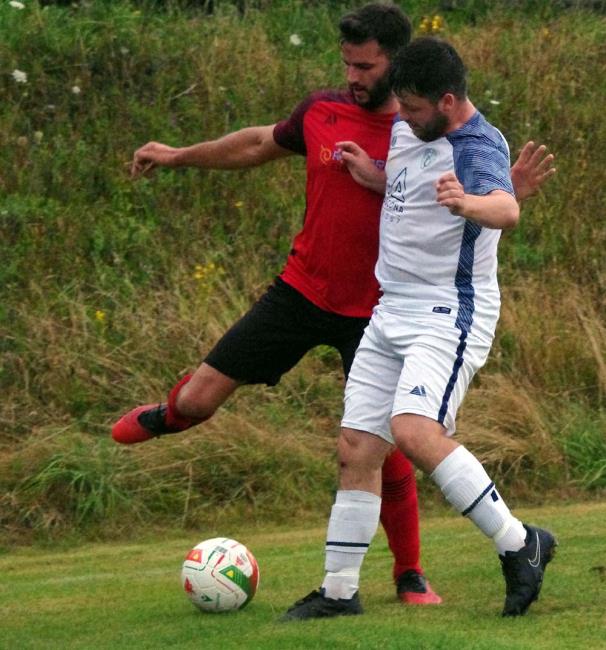 Ben John put under pressure in the clash between Clarbeston Road versus Fishguard Sports. Picture Gordon Thomas Ben John put under pressure in the clash between Clarbeston Road versus Fishguard Sports. Picture Gordon Thomas