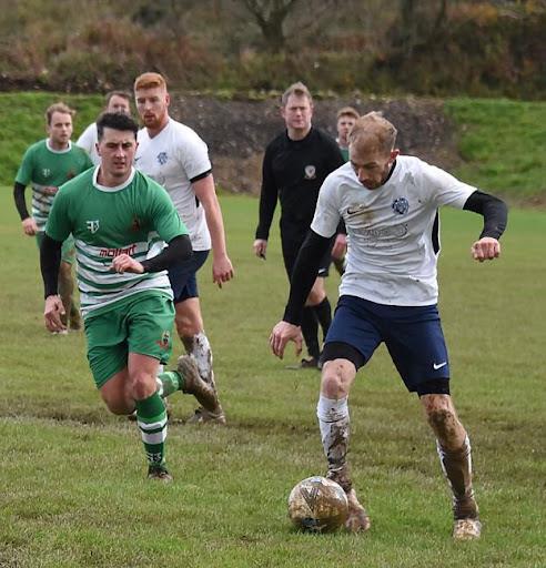 Karl Hedley scored a fine header for unbeaten Fishguard Sports at Monkton