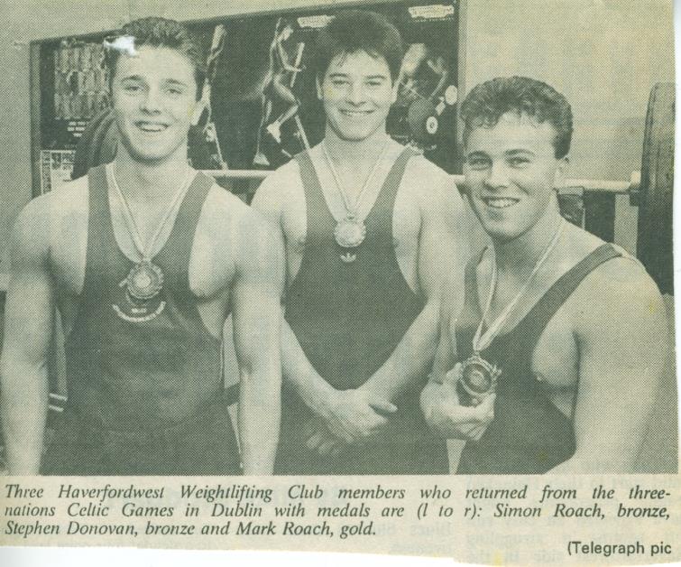Stephen wins a medal at Celtic Games alongside brothers Mark and Simon Roach