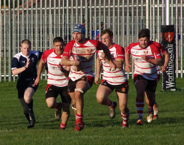 Sam Dolling on charge for Milford Haven.