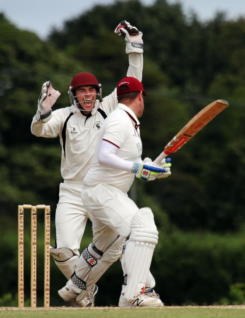 Sean Hannon celebrates the wicket of Dan Cherry