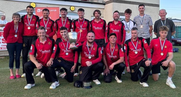 Champions Carew with the trophy