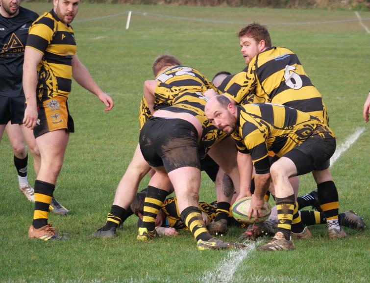 Ian Griffiths gets a Llangwm attack under way