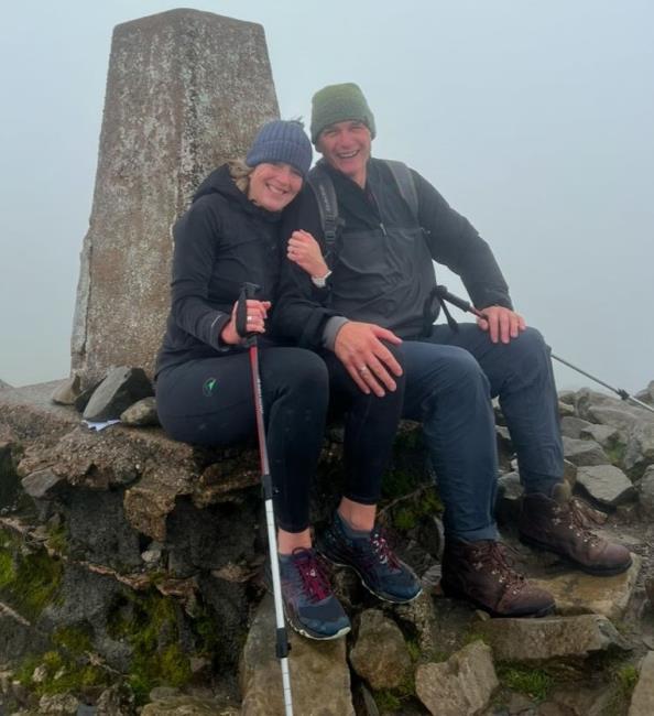 Bill and wife Lisa up a mountain
