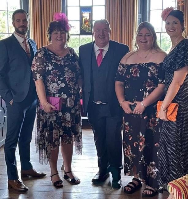 The Ashmans look smart at a recent weddding