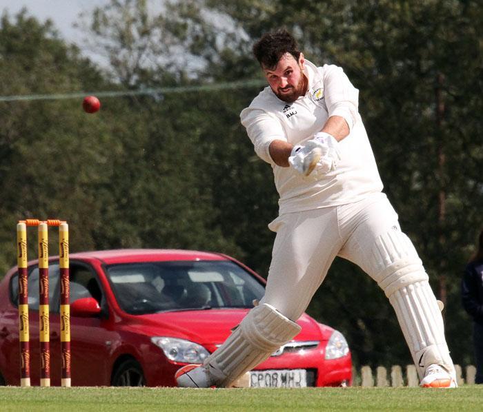 Brad McDermott-Jenkins hits a boundary