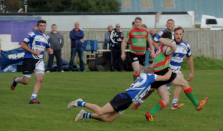 A flying tackle by a Seagull!
