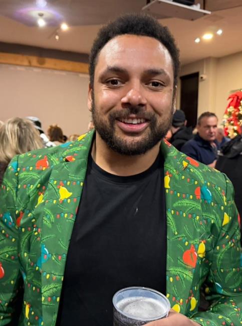 Aaron James - looking cool in his green jacket