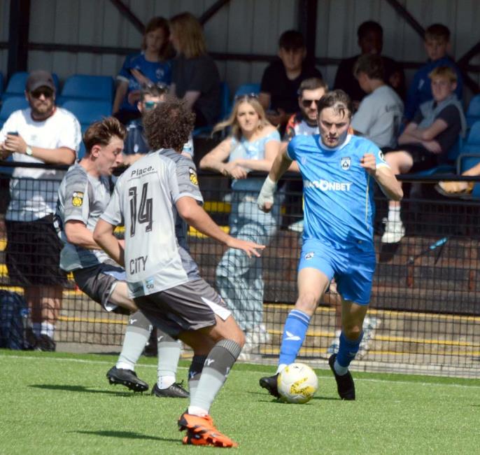 Alaric Jones pushes forward for The Bluebirds. Picture Gordon Thomas