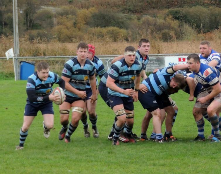 Griff Jones snipes away for an Aber try