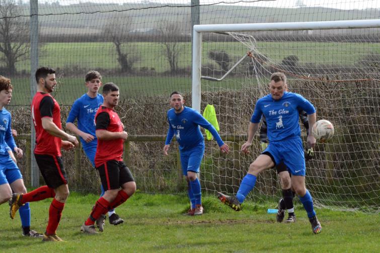 Dai Davies clears danger for Bridge against Clarby Road