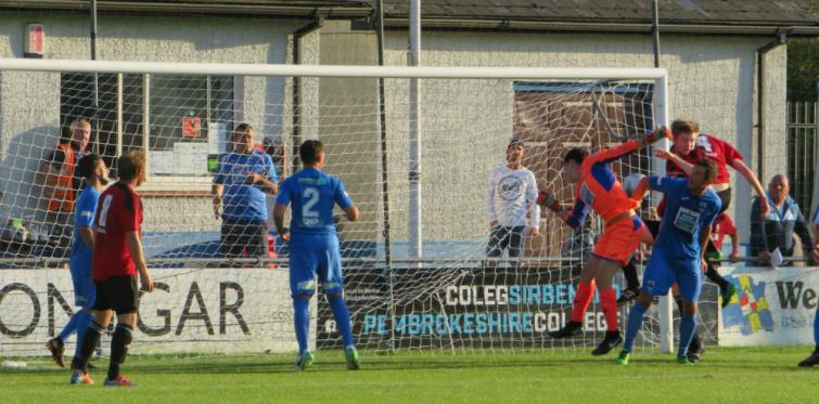 Goalmouth action at the Conygar Bridge Meadow Stadium