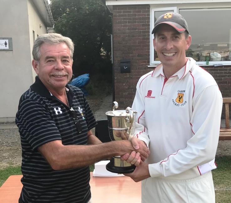 Kevin Jenkins presents the trophy to Gareth Lewis