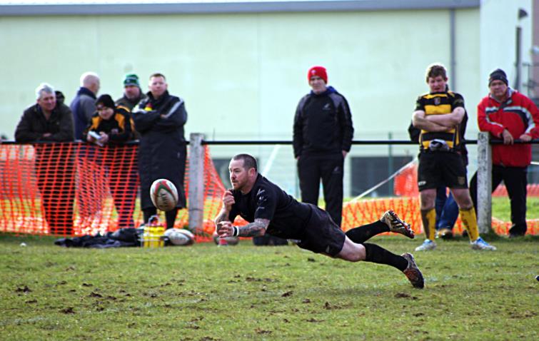 Classic scrum half diving pass by Mark Riley of Neyland