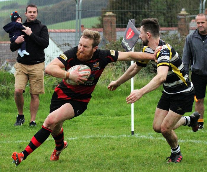Yannick Parker scores for Tenby United. Picture by Brian McKehon