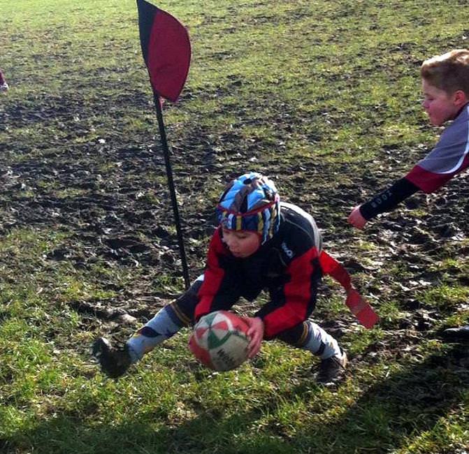 Owen Rickard scores a try
