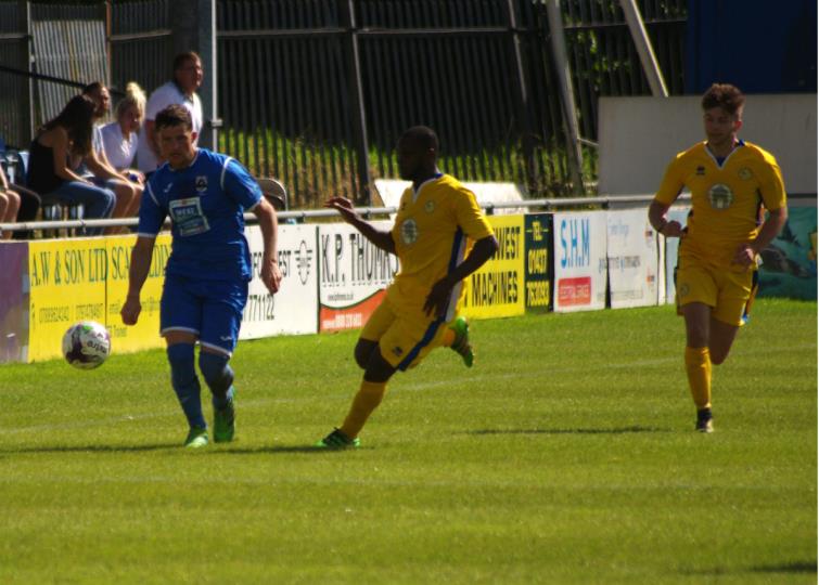 Haverfordwest County right back Matthew Broome looks to play the ball down the channel