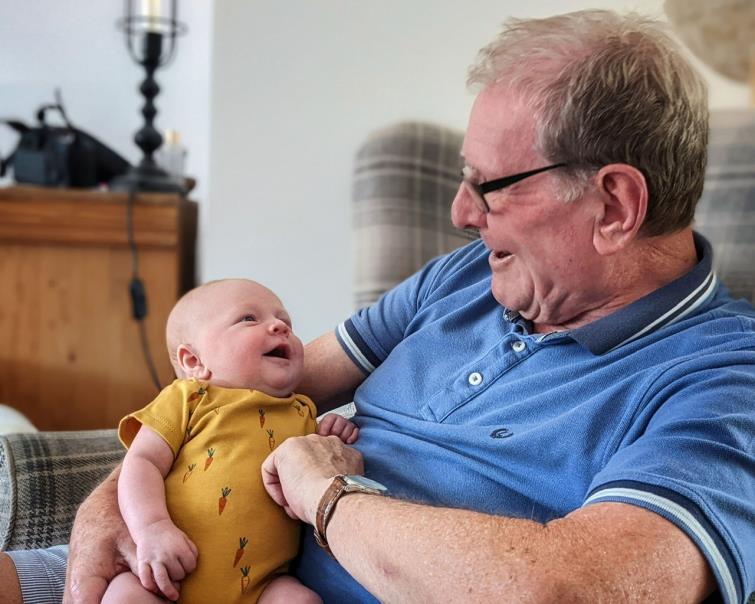 Mike Bradney and grandchild