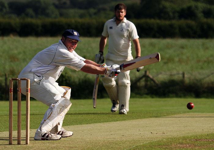 Simon Holliday steers a ball to the boundary for Haverfordwest 
