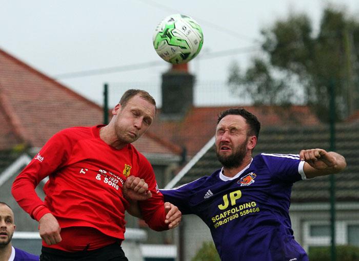Carews Jack Christopher and West Dragons Lee Palmer compete in the air