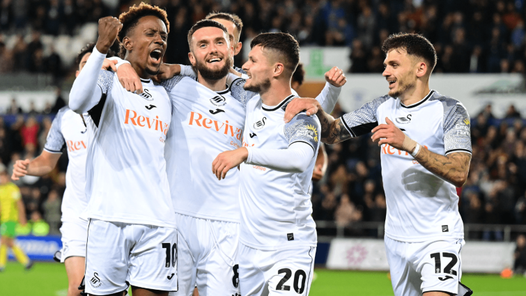 Swansea City celebrate victory against Norwich City