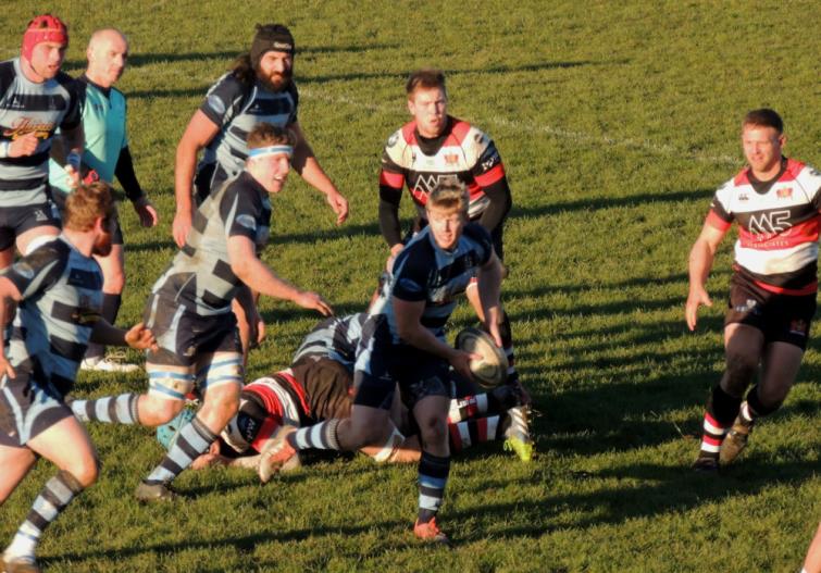 Rhys Lane looks to break clear