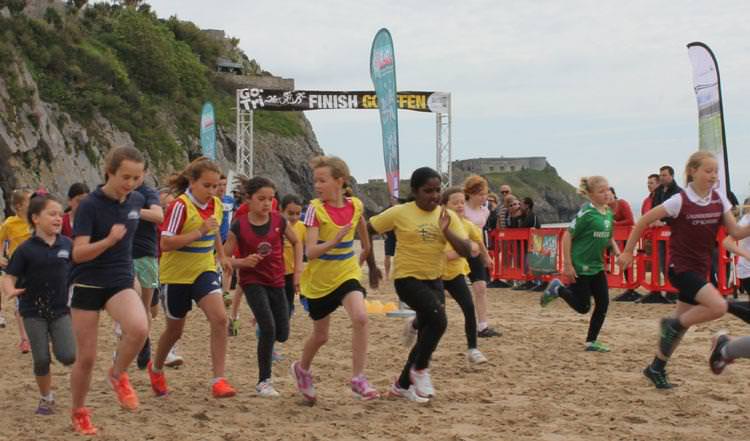 Pupils enjoy beach run at Tenby
