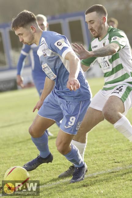 Ben Fawcett shields the ball